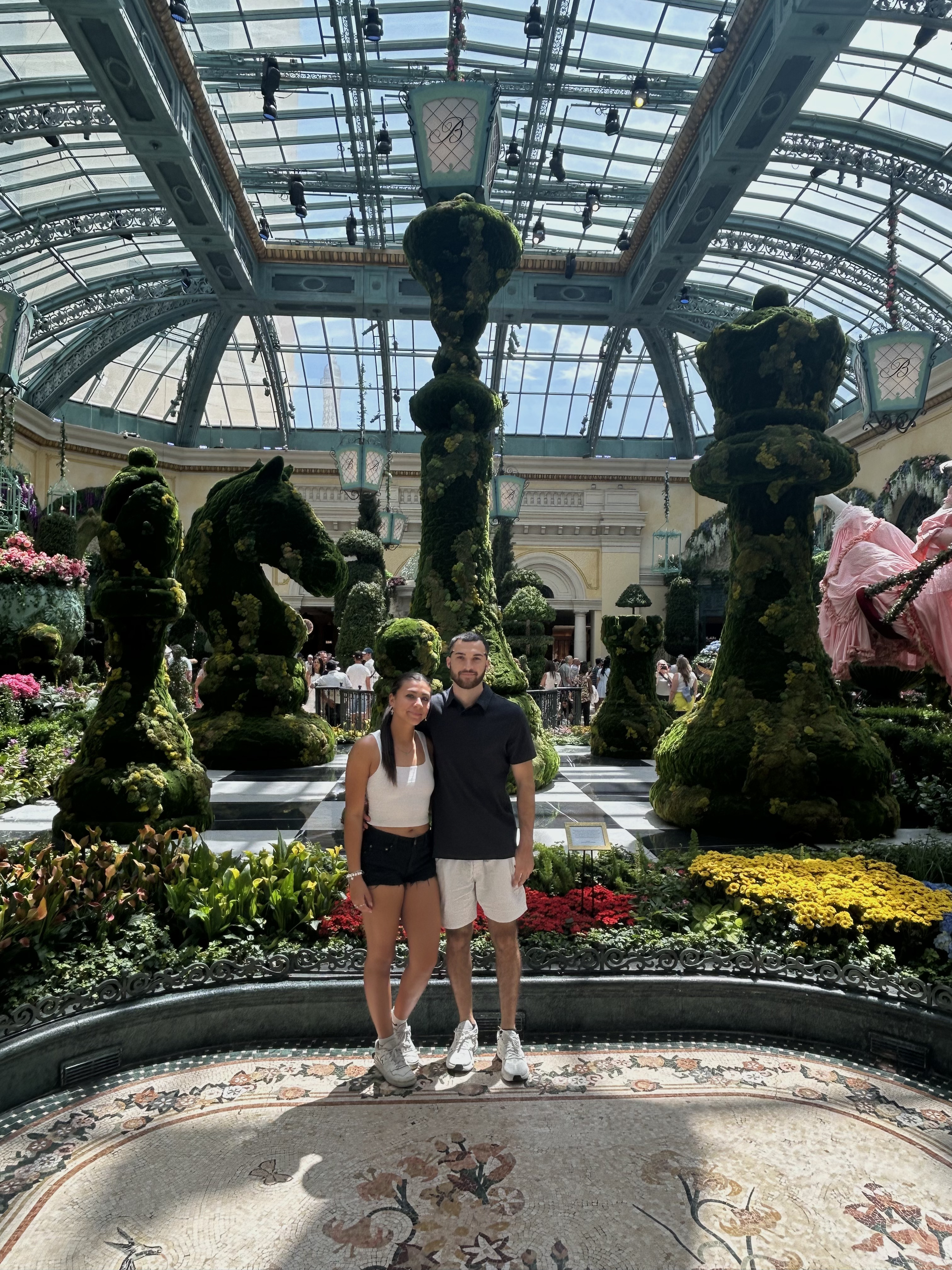 Devyn and his girlfriend posing at the bellagio hotel in Las Vegas